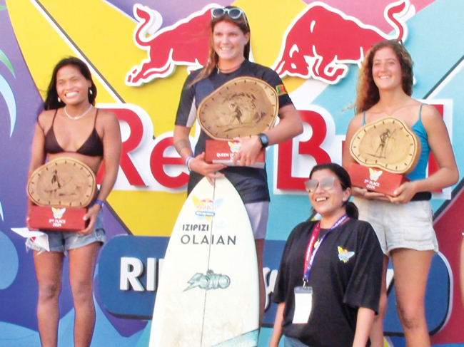 Top three women's surfers with their awards