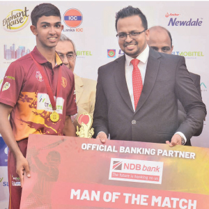 Man of the Match Dinada Athalage of Ananda receiving the award. 