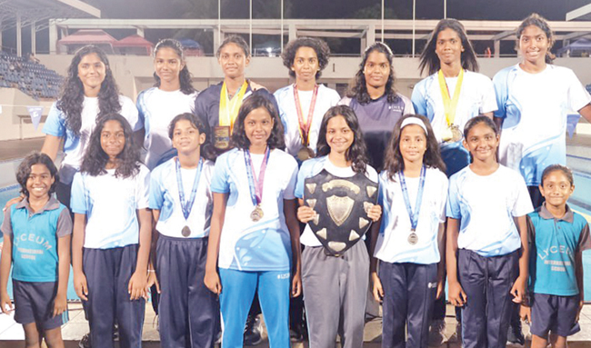 Lyceum International School Wattala girls swimming team proudly holds their first-ever Girls Overall Championship Shield, clinched at the 48th National Age Group Swimming Championship final day at the Sugathadasa Stadium Swimming Pool yesterday.